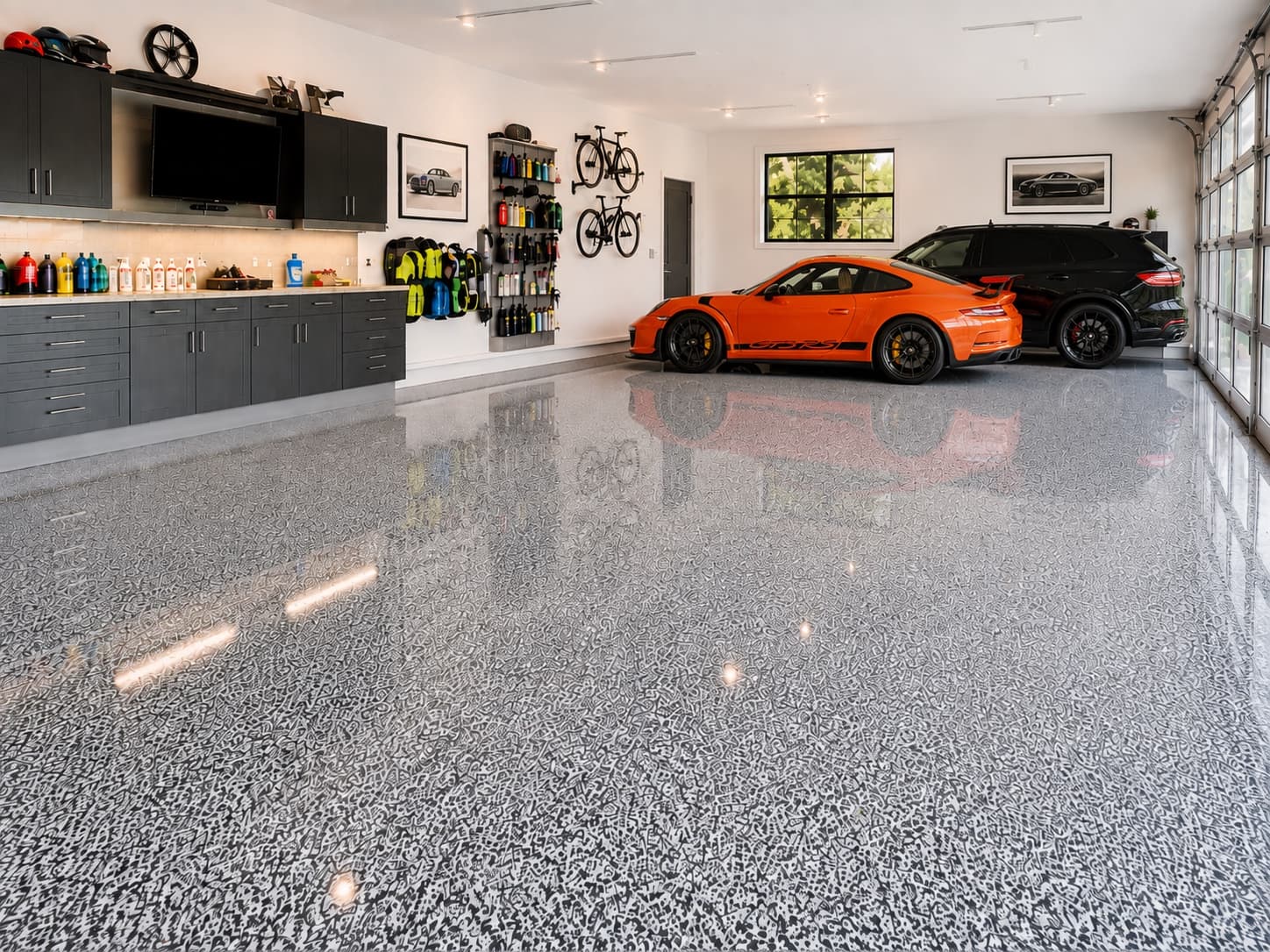 Luxury garage with a graphite flake floor